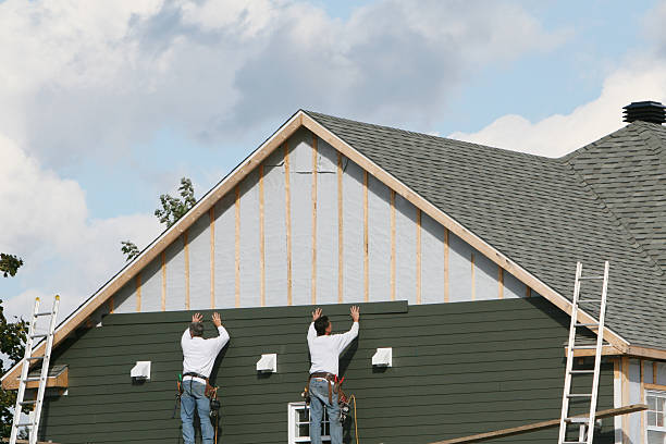 Professional Siding Replacement technician working in Englewood, OH